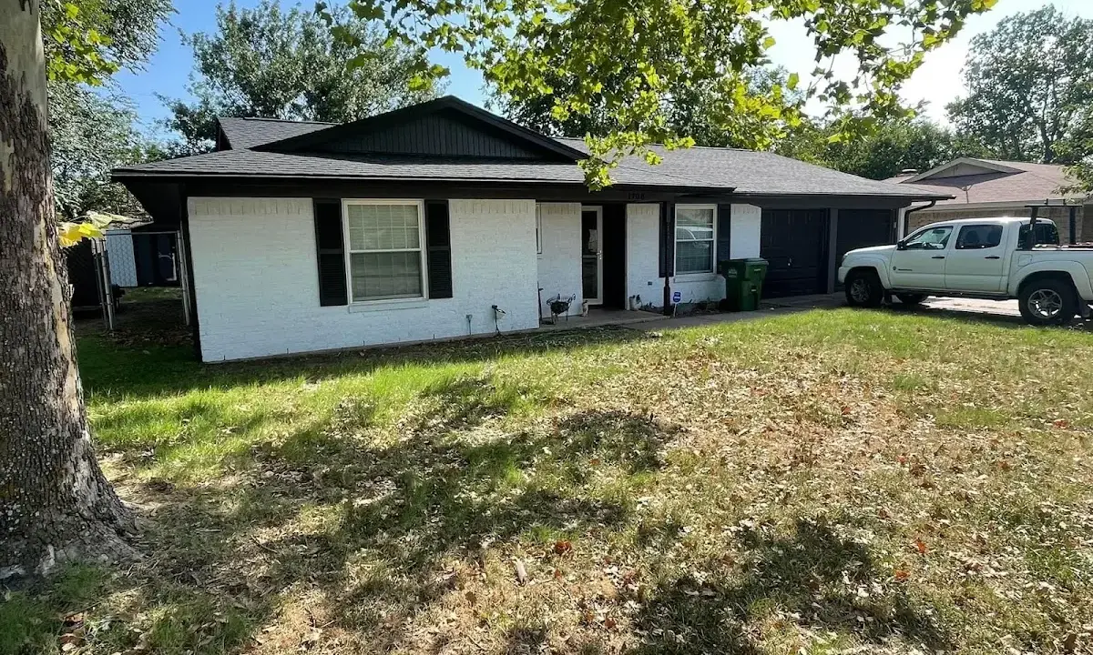 Professional roofing crew working on a residential roof in Tiburon
